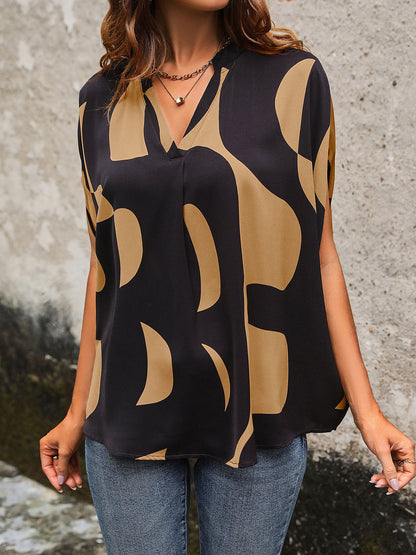 Perfee Printed Notched Slit Half Sleeve Blouse